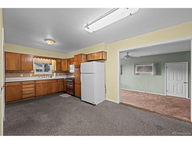 212 4th St, Fort Lupton, CO 80621
