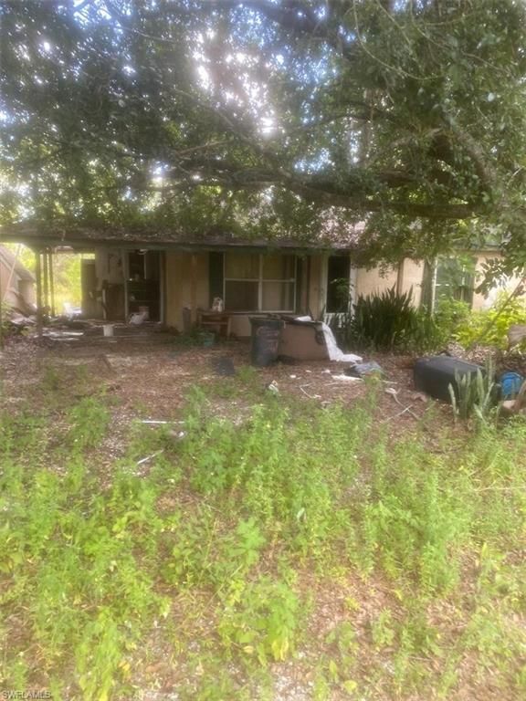 1118 McArthur AVE, LEHIGH ACRES, FL 33936 — exterior