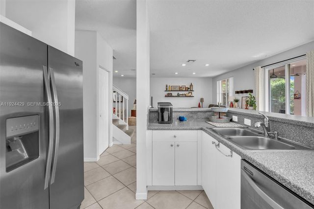 1058 Tupelo Way, Weston, FL 33327