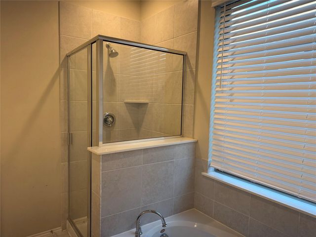 8711 Windsong Trail Drive, Missouri City, TX 77459