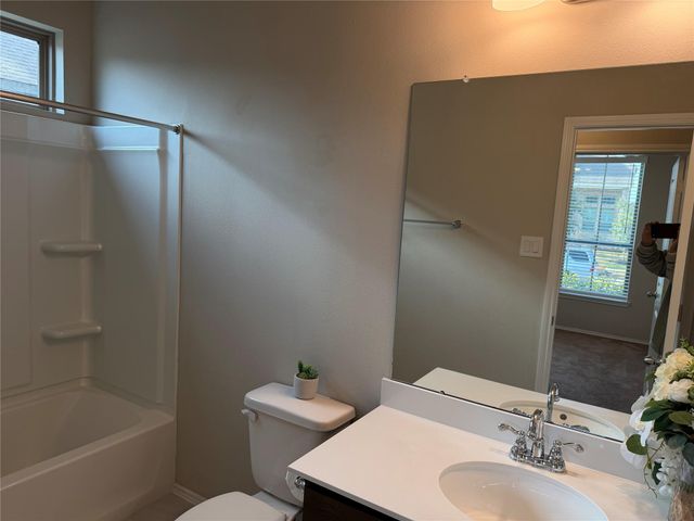 8711 Windsong Trail Drive, Missouri City, TX 77459