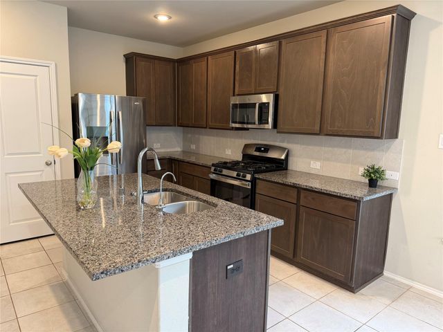 8711 Windsong Trail Drive, Missouri City, TX 77459