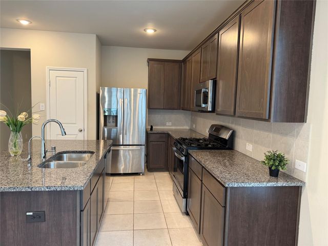 8711 Windsong Trail Drive, Missouri City, TX 77459