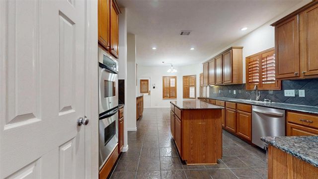 11303 Blossom Lake Court, Cypress, TX 77433