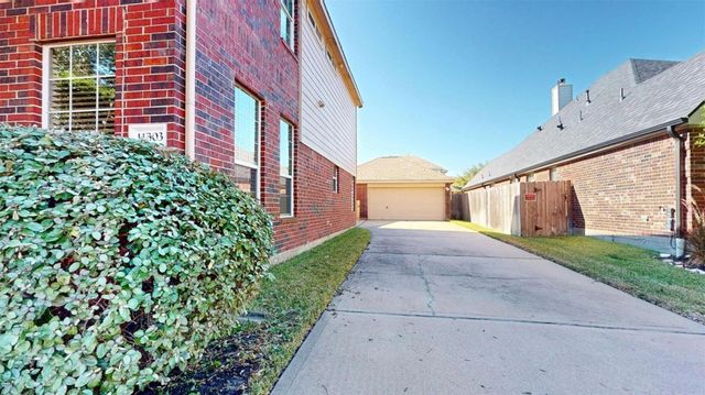 11303 Blossom Lake Court, Cypress, TX 77433