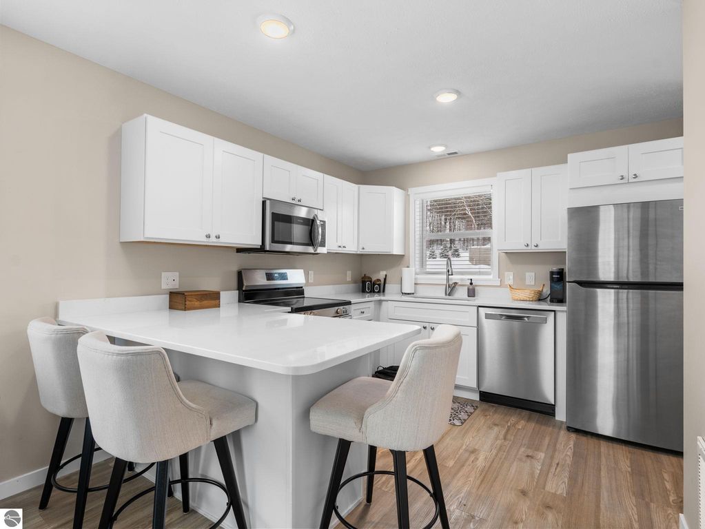 Image 5 of property listing at 3788 Woodgate Drive, Traverse City, MI 49686