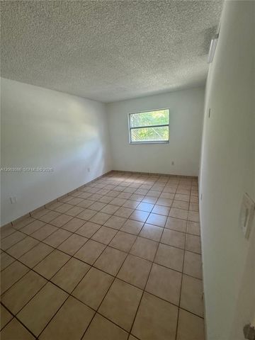 4265 NW South Tamiami Canal Dr 1-214, Miami, FL 33126