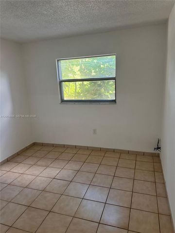 4265 NW South Tamiami Canal Dr 1-214, Miami, FL 33126