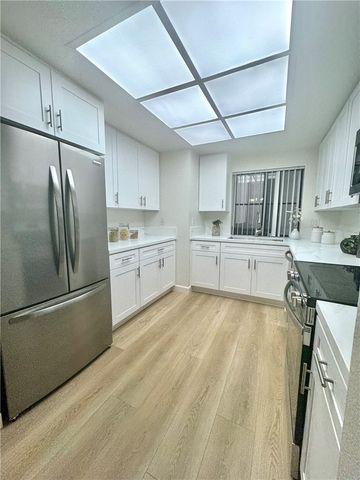 8877 Lauderdale Court 210-G, Huntington Beach, CA 92646
