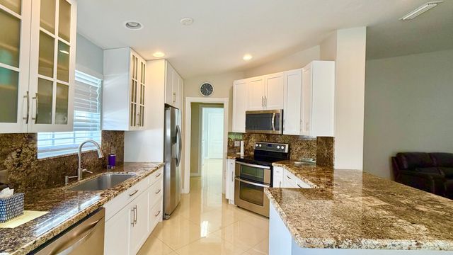 7735 Pine Island Way, West Palm Beach, FL 33411