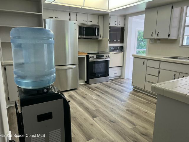 6031 Barna Avenue, Titusville, FL 32780