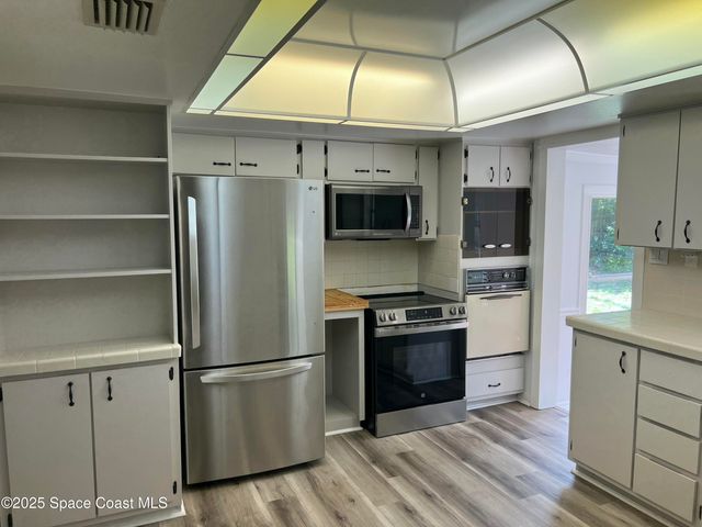 6031 Barna Avenue, Titusville, FL 32780