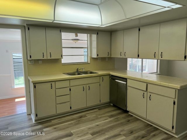 6031 Barna Avenue, Titusville, FL 32780