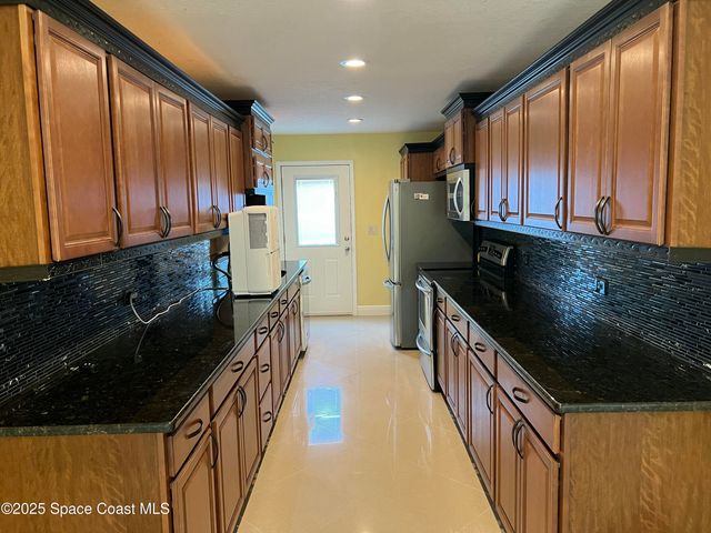 6031 Barna Avenue, Titusville, FL 32780