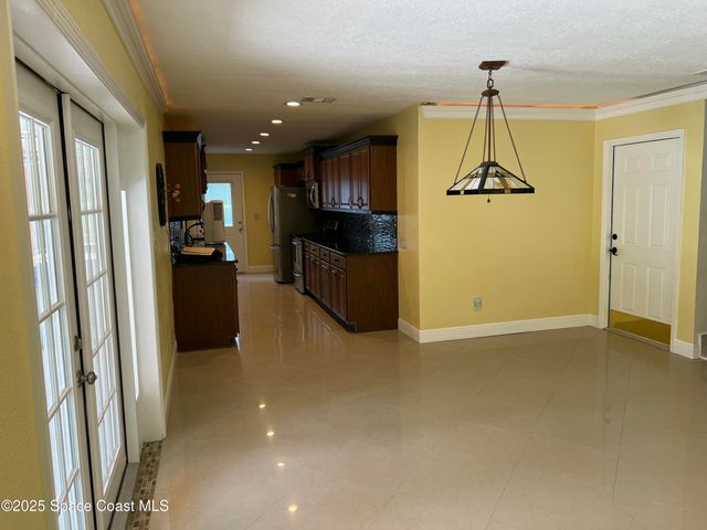 6031 Barna Avenue, Titusville, FL 32780