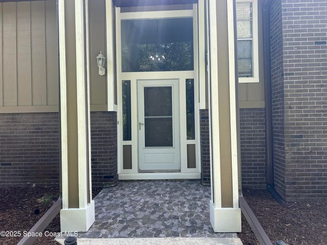 6031 Barna Avenue, Titusville, FL 32780