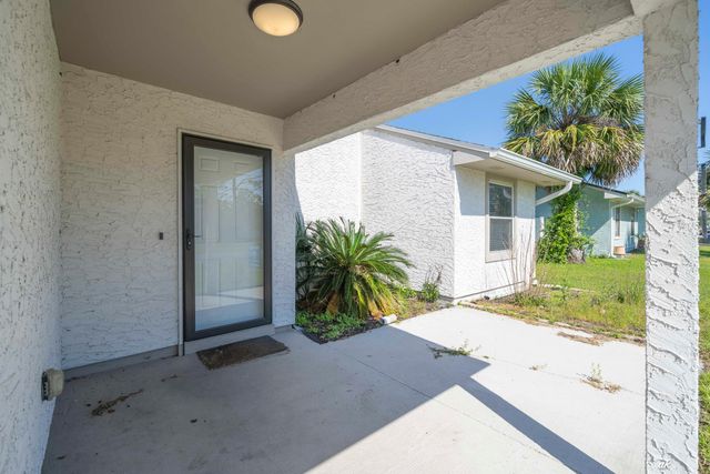 911 Pelican Place, Panama City Beach, FL 32407