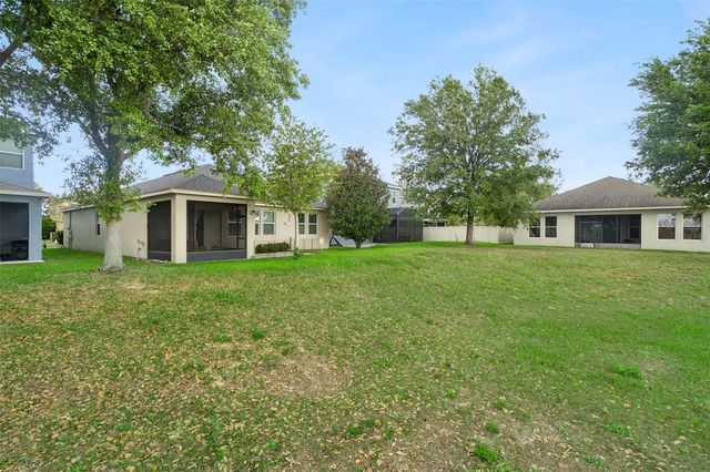 706 BAREFOOT BAY LOOP, Groveland, FL 34736