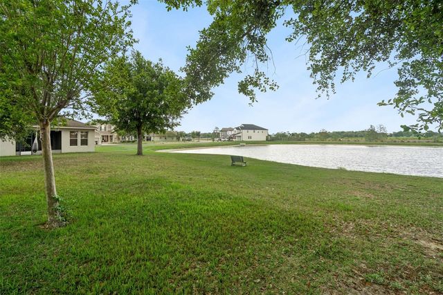 706 BAREFOOT BAY LOOP, Groveland, FL 34736