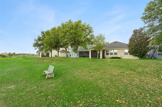 706 BAREFOOT BAY LOOP, Groveland, FL 34736