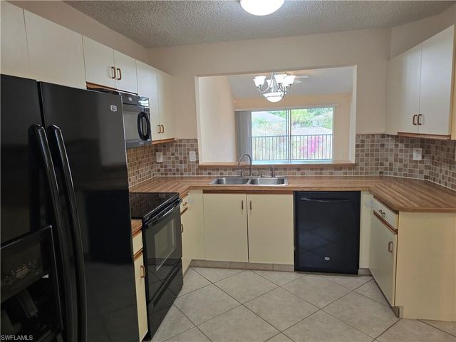 5741 Whitaker RD D203, Naples, FL 34112