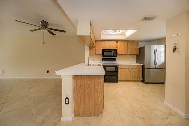 1501 Palm Beach Trace Drive, Royal Palm Beach, FL 33411