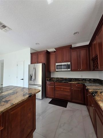 10030 STRATFORD POINTE AVENUE, Orlando, FL 32832