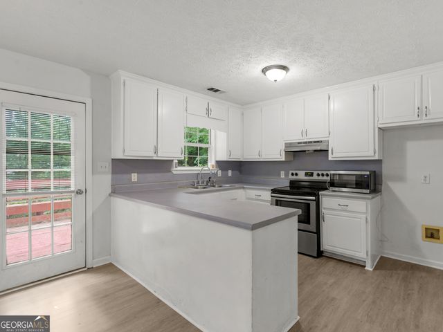 3055 Deerfield Way, Rex, GA 30273
