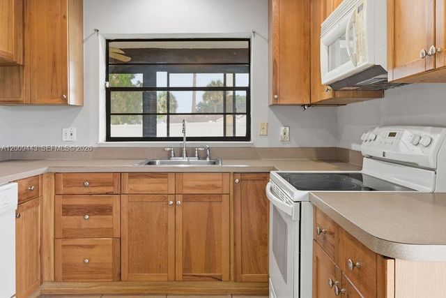 6125 Elsinore Cir, Green Acres, FL 33463