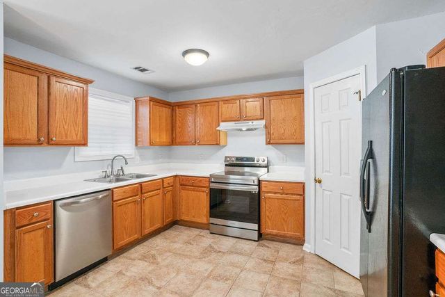 1461 ENCHANTED FOREST Drive, Conley, GA 30288