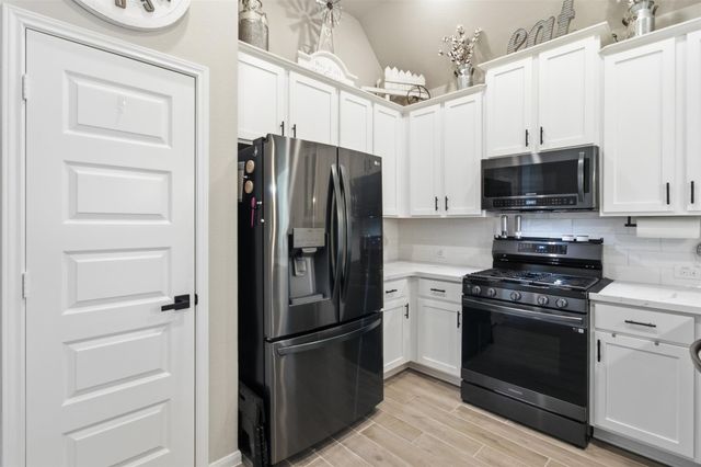 11668 Whirlaway Drive, Willis, TX 77318