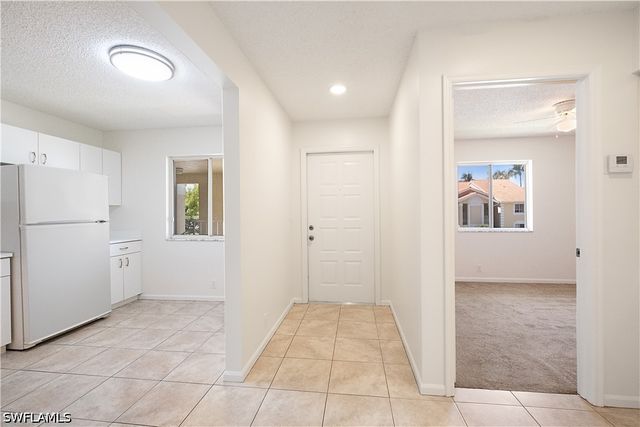 7791 Esmeralda WAY 203, Naples, FL 34109