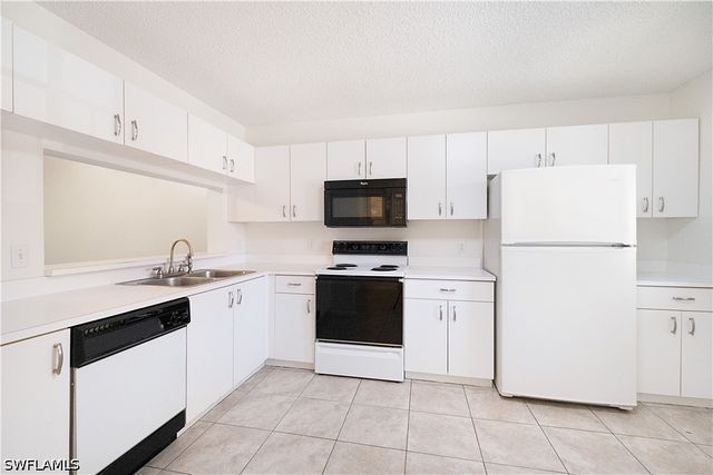 7791 Esmeralda WAY 203, Naples, FL 34109