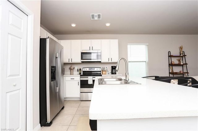 15026 Wildflower CIR, Naples, FL 34119