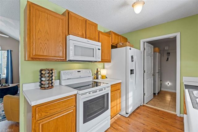 5507 Whispering Pines Drive, Summerfield, NC 27358