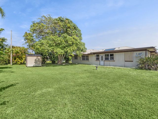 1134 SE Mendavia Avenue, Port St Lucie, FL 34952