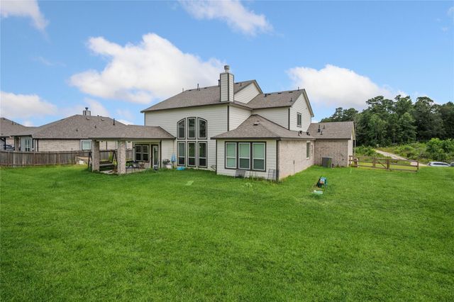 9559 Moss Rose Lane, Willis, TX 77378