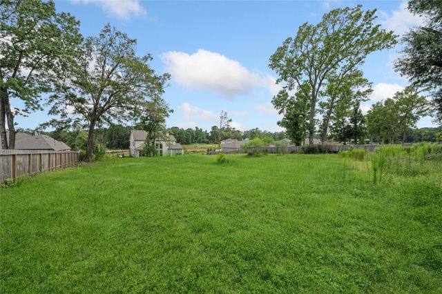 9559 Moss Rose Lane, Willis, TX 77378