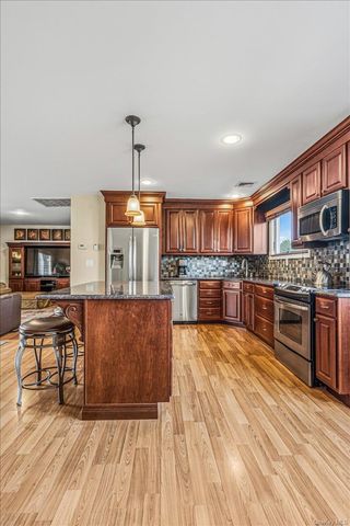 63 Kingfisher Road, Levittown, NY 11756