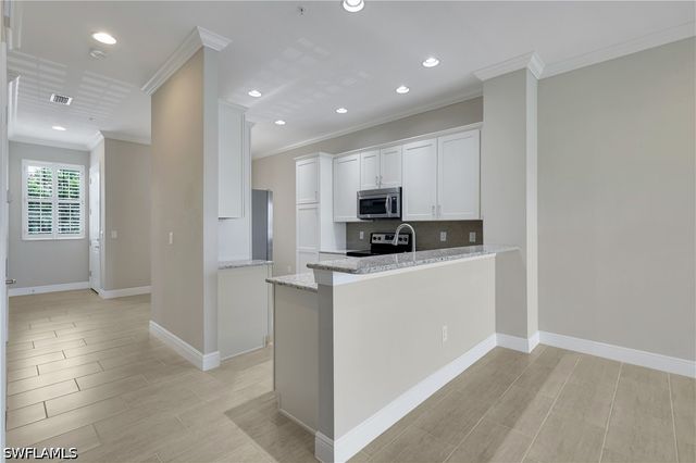 15114 Palmer Lake CIR 203, Naples, FL 34109