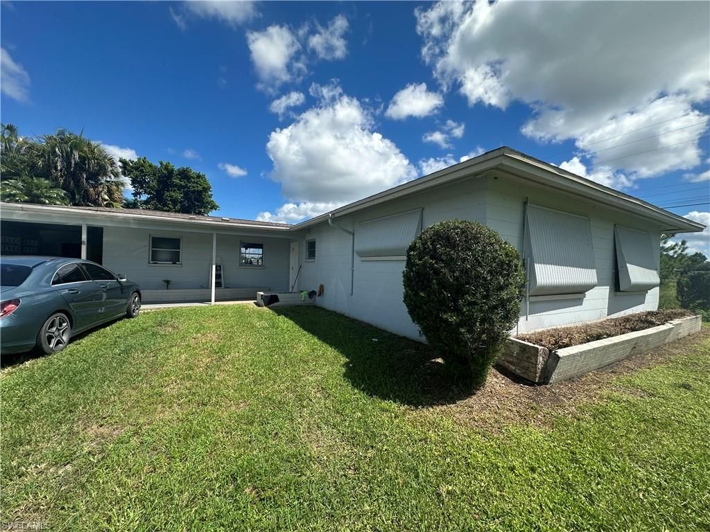 1109 E Jasmine RD, LEHIGH ACRES, FL 33936 — exterior