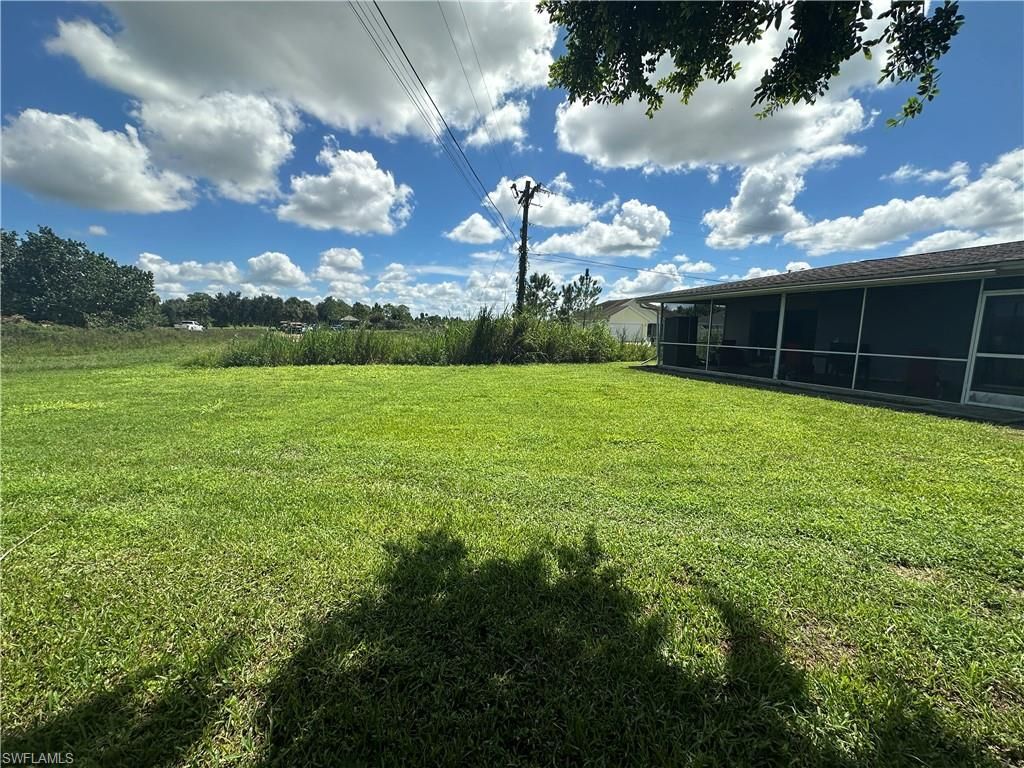 1109 E Jasmine RD, LEHIGH ACRES, FL 33936 — photo 4
