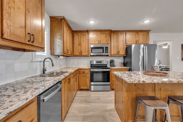 909 Erwin Road, Poolville, TX 76487
