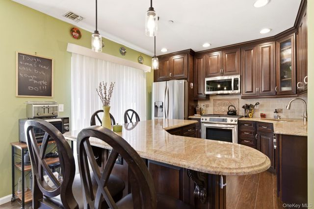 1 Robert Lane, Middle Island, NY 11953