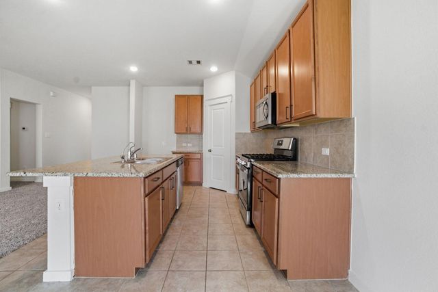 40477 Mostyn Lake Drive, Magnolia, TX 77354