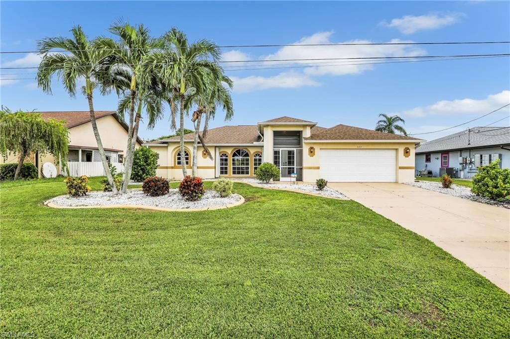 323 SE 9th AVE, CAPE CORAL, FL 33990 — exterior