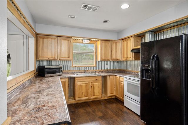 8911 Carraway Lane, Magnolia, TX 77354