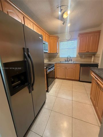 5080 SW 64th Ave 104, Davie, FL 33314