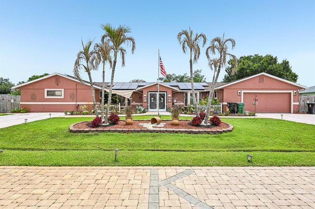 2457 SW Mercer Street, Port St. Lucie, FL 34984