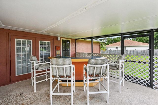 2457 SW Mercer Street, Port St. Lucie, FL 34984